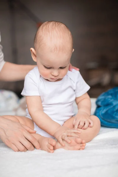 Cute baby boy on bed — Stock Photo