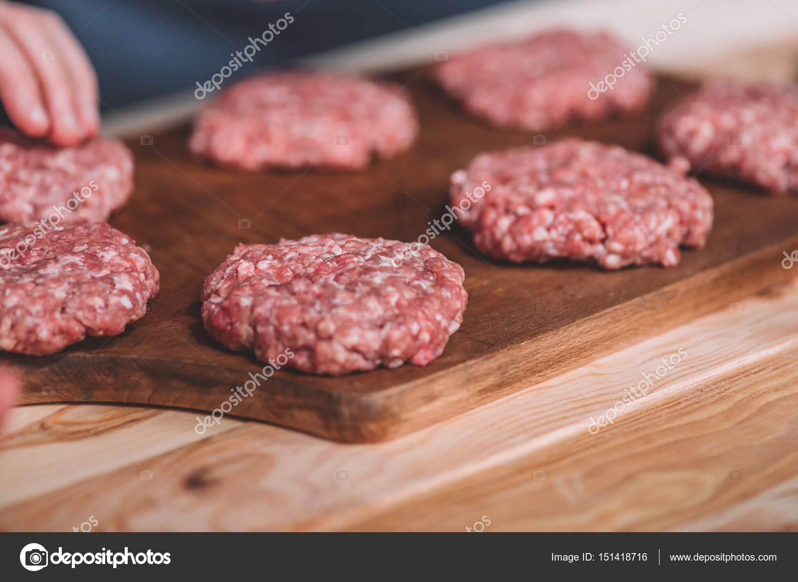 Raw meat patties — Stock Photo © AlexLipa #151418716