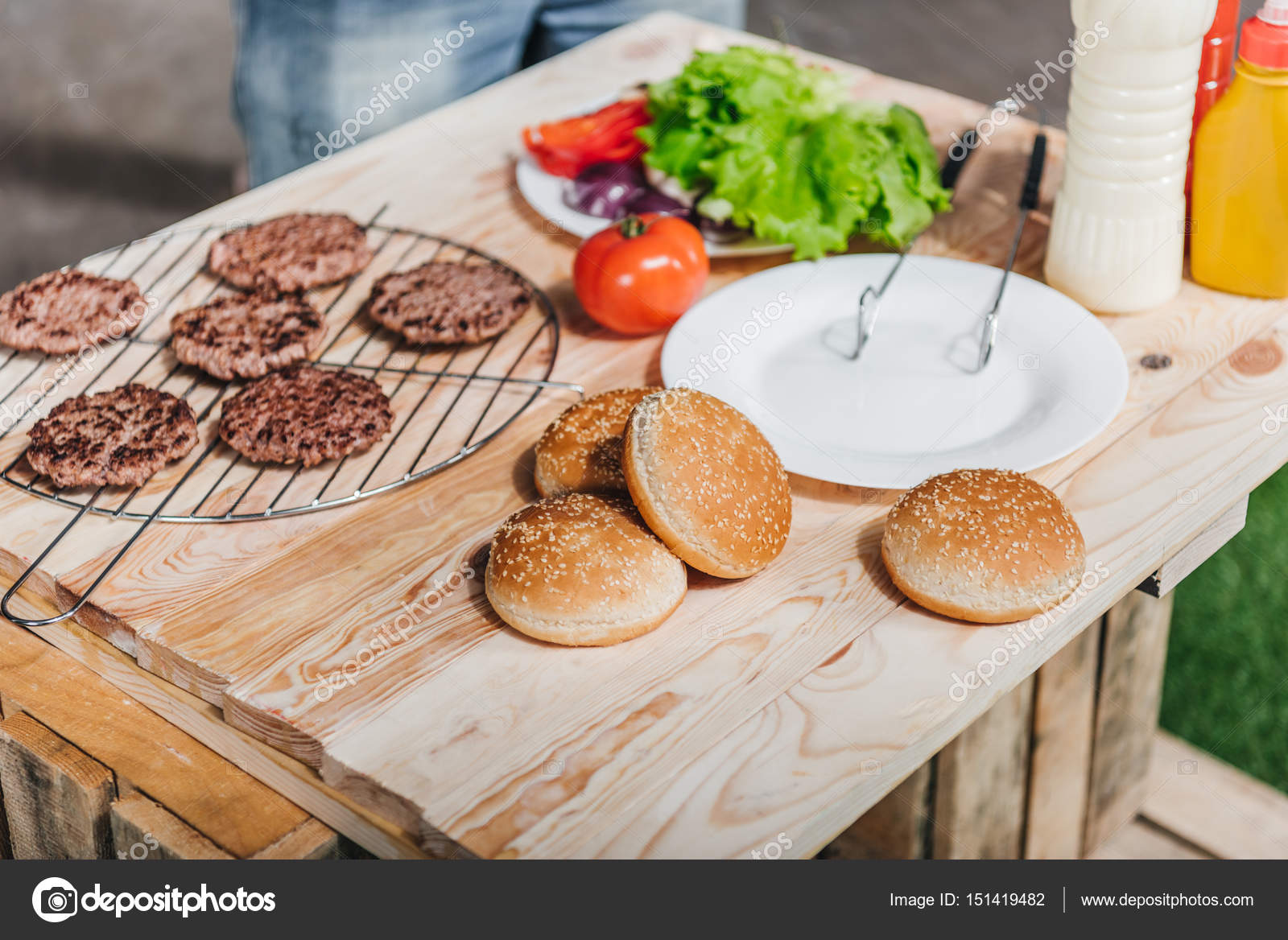 Burgers ingredients on table — Stock Photo © AlexLipa 151419482