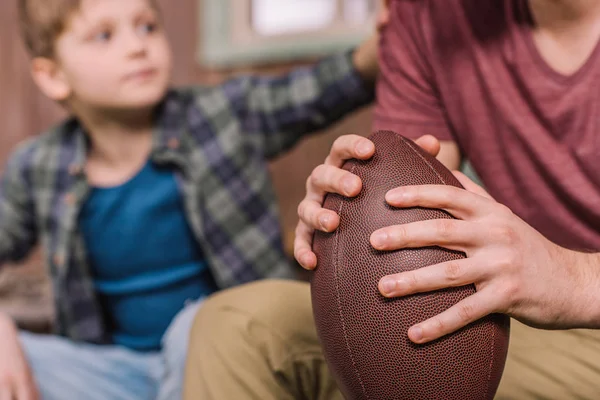 Father with son sitting on porch — Stock Photo, Image