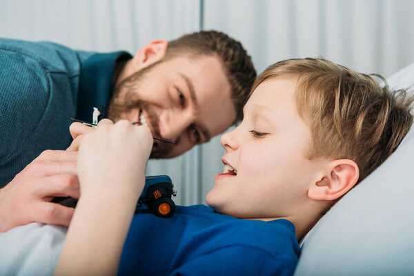 Dad and son in hospital 
