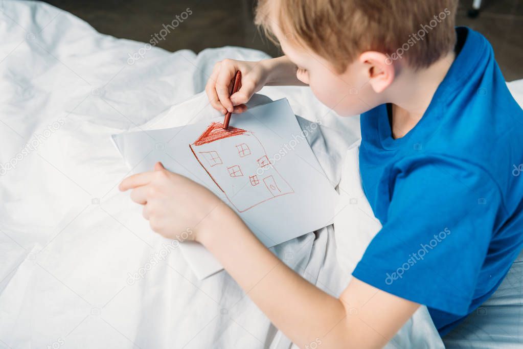 boy drawing picture