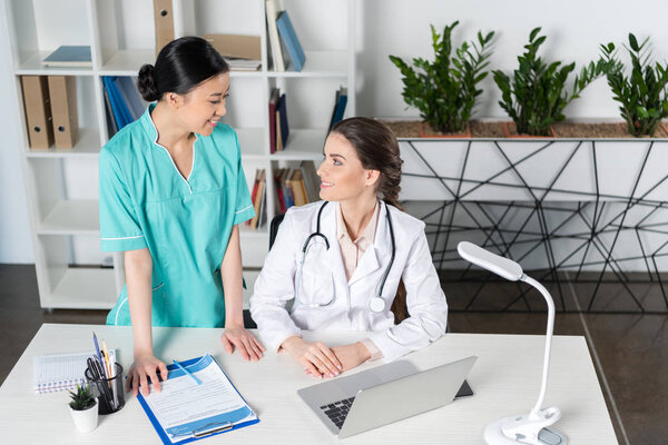 internist talking with doctor  