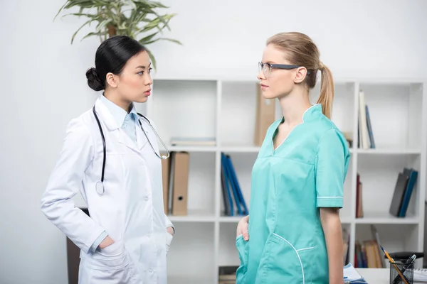 Young doctors in clinic — Stock Photo, Image