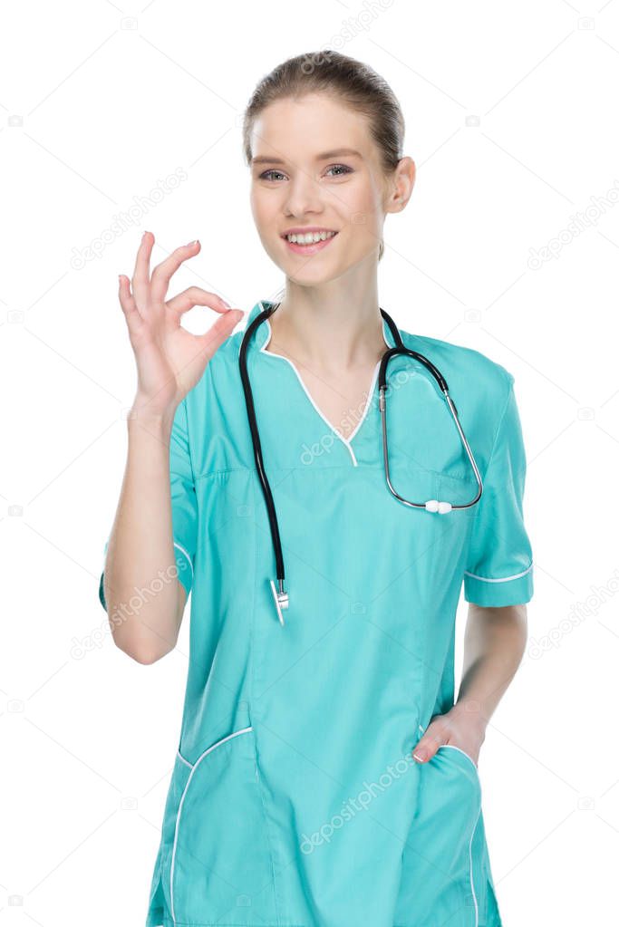 smiling nurse showing ok sign