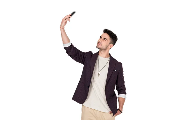 Молодой человек с помощью смартфона — стоковое фото
