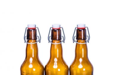 three sealed beer bottles clipart