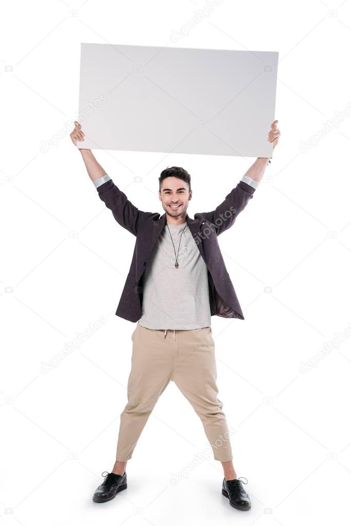 caucasian man holding blank board