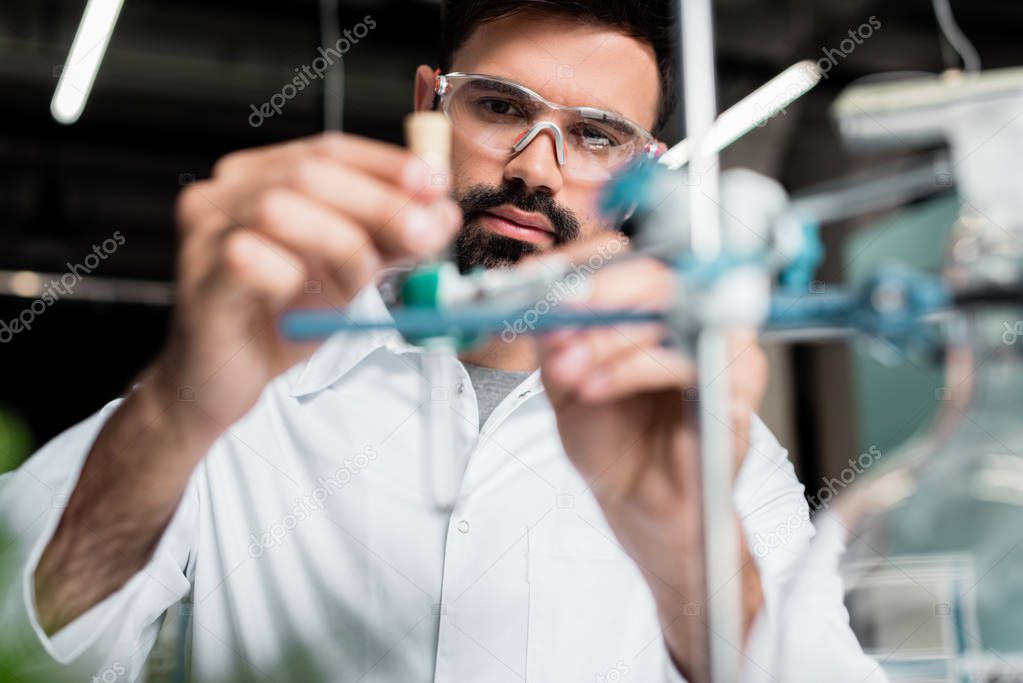 Scientist making experiment   