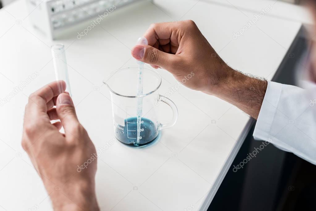 Scientist making experiment 