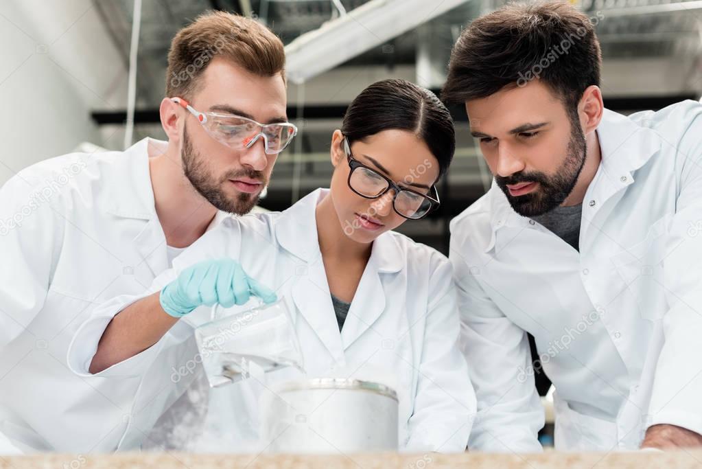 Scientists working in laboratory