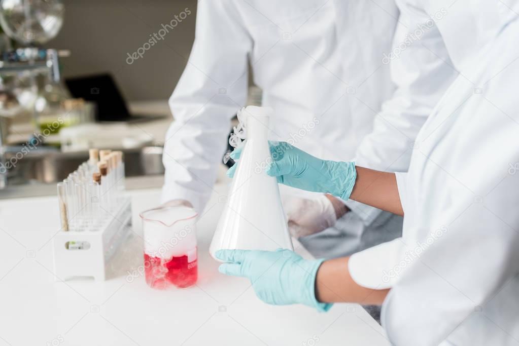Scientists making experiment     