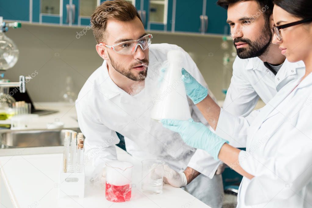Chemists working in laboratory