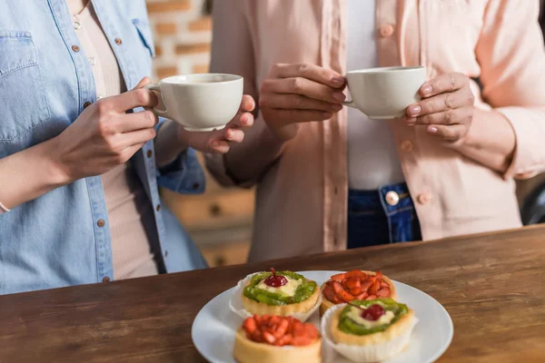 Women having good time in kitchen — Stock Photo, Image