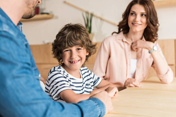 beautiful young family in cafe