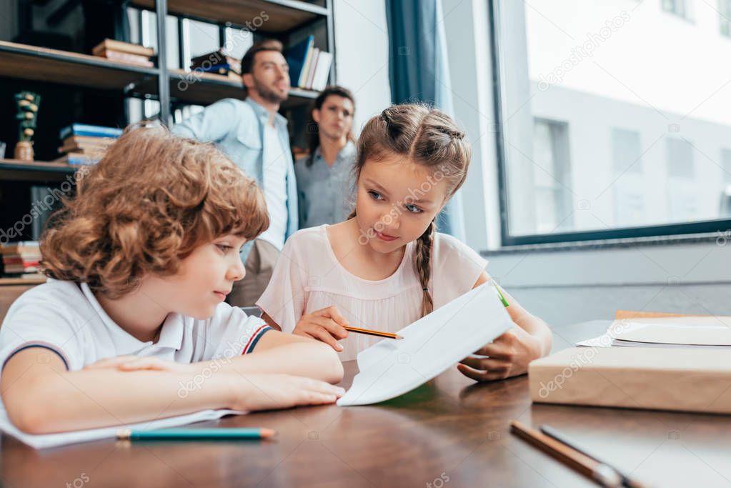 kids doing homework together