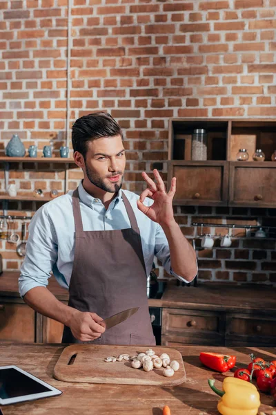 young man cooking