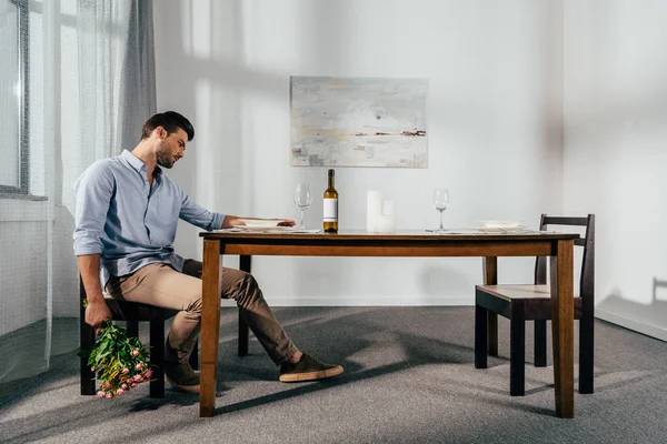 Depressed man waiting for date — Stock Photo, Image