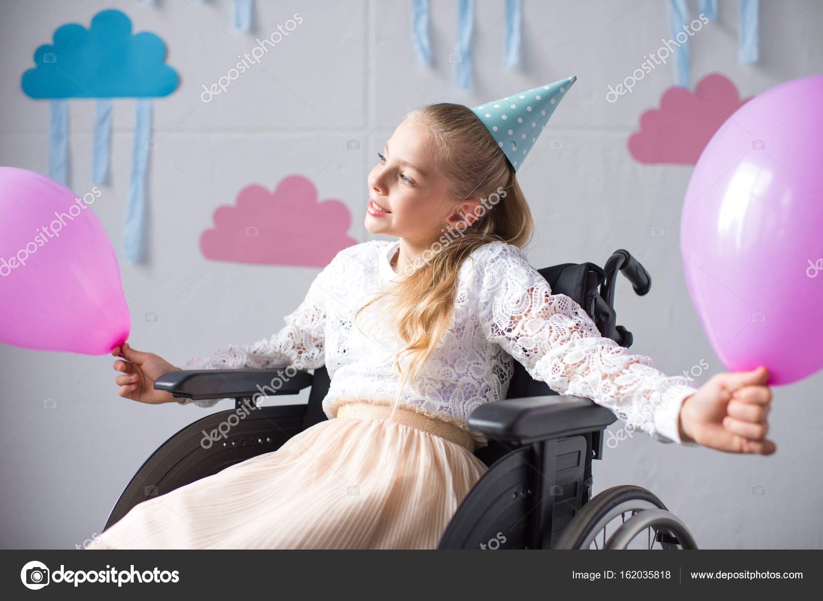 Disabled girl at birthday party — Stock Photo © AlexLipa 162035818
