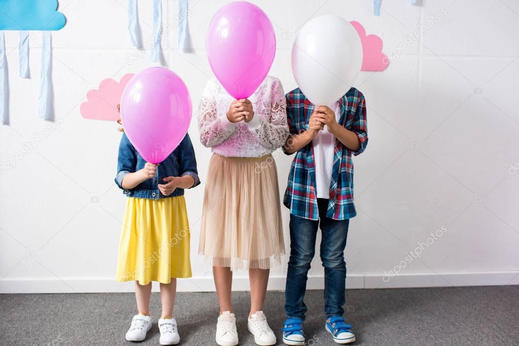 adorable kids with balloons