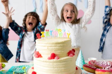 happy kids with birthday cake clipart