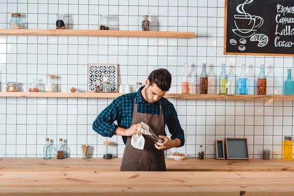 Barista cleaning glass — Stock Photo, Image