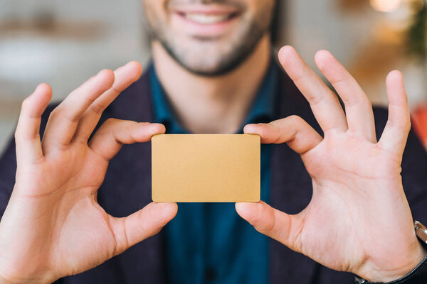 Businessman showing business  card