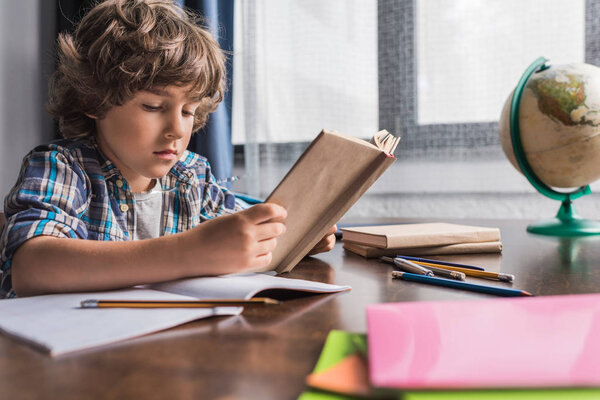 kid reading book