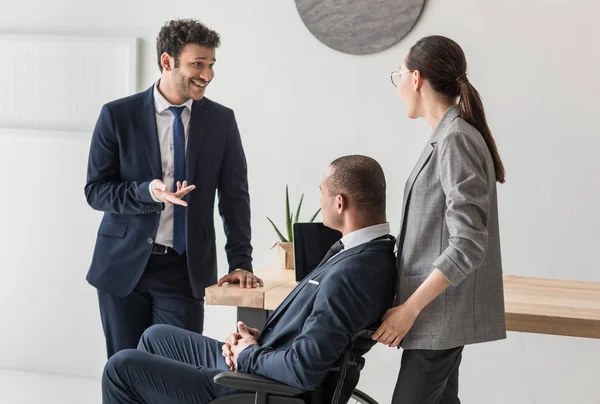 Multiethnic businesspeople in office — Stock Photo, Image