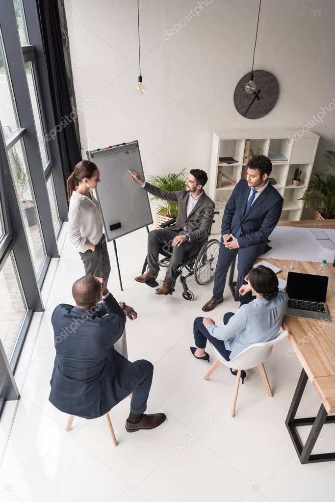 multicultural businesspeople discussing business strategy