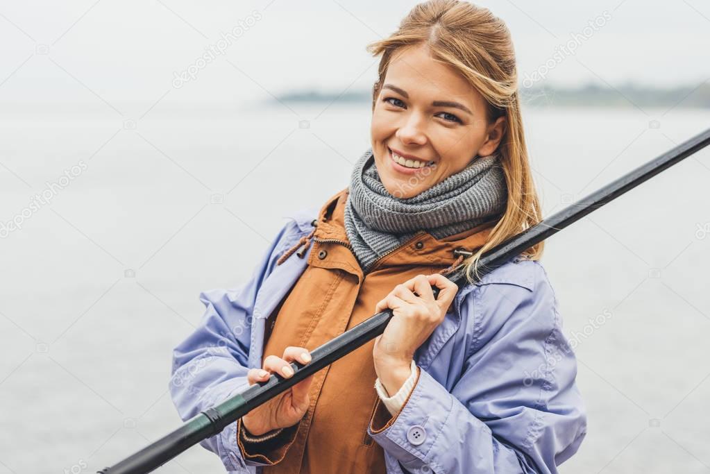 woman with fishing rod