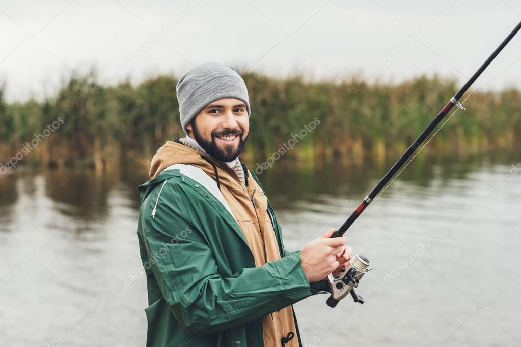 man fishing on cloudy day