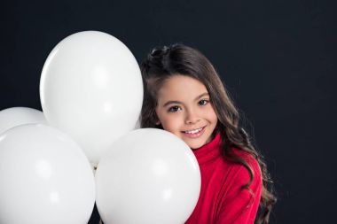 helyum balonları ile çocuk