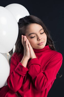 Beyaz Balon üzerinde uyuyan çocuk 