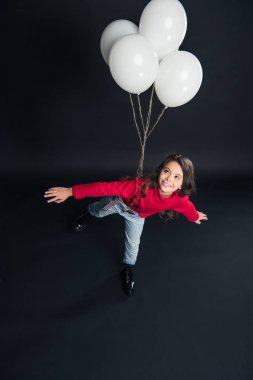 uçan balonlar ile taklit çocuk