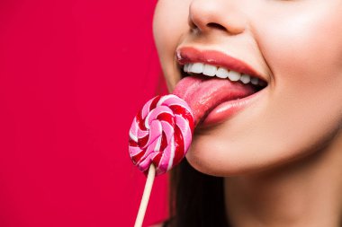 woman licking colored lollipop  clipart