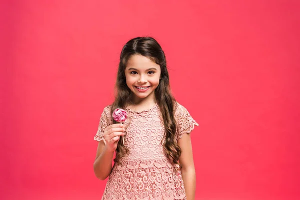 Kid standing with lollipop — Stock Photo, Image