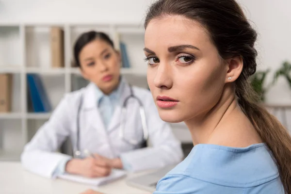 Upset patient looking at camera — Stock Photo