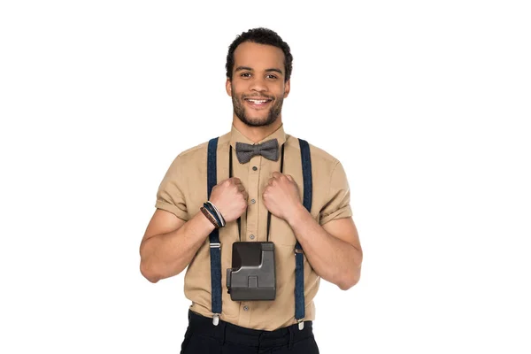 Young man with instant camera — Stock Photo