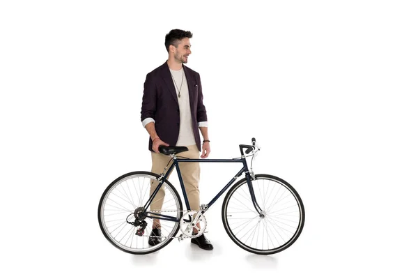 Elegante giovane uomo con bicicletta — Foto stock