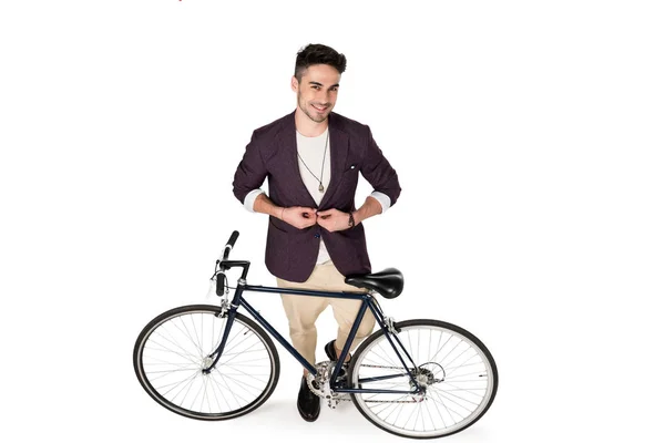 Jeune homme élégant avec vélo — Photo de stock