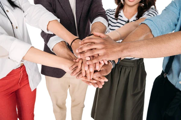 Friends putting hands together — Stock Photo