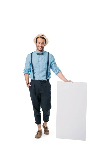 Stylish man holding blank board — Stock Photo