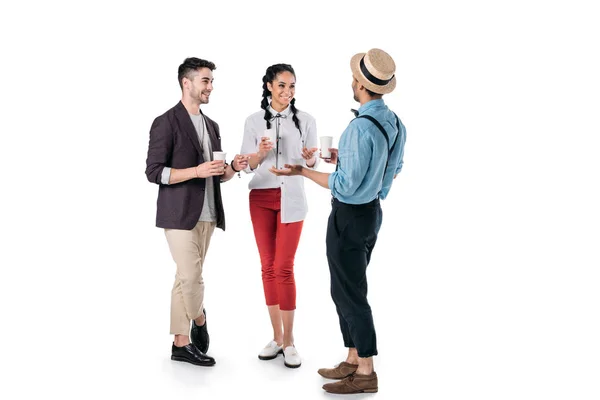 Multiethnic friends talking while drinking coffee — Stock Photo