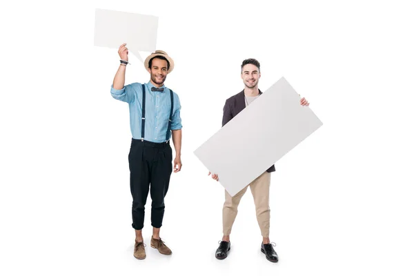 Multiethnic friends holding blank banners — Stock Photo