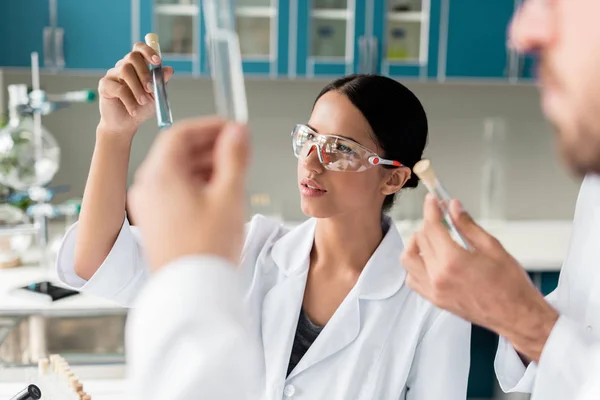 Scientists in chemical laboratory — Stock Photo