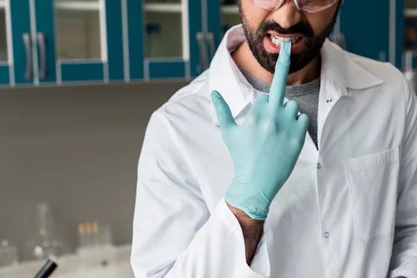 Scientist in protective glove — Stock Photo