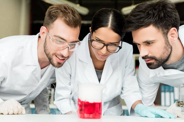 Young scientists in laboratory — Stock Photo