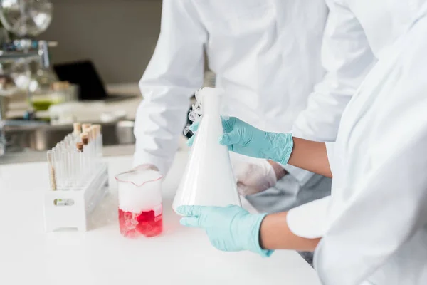 Scientists making experiment — Stock Photo