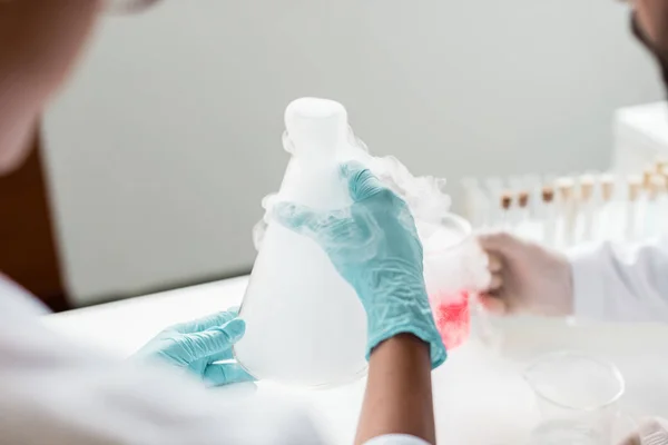 Scientists making experiment — Stock Photo